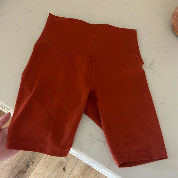Like new Lulu lemon short. Size 2. Rust/orange color. - Picture 3 of 3